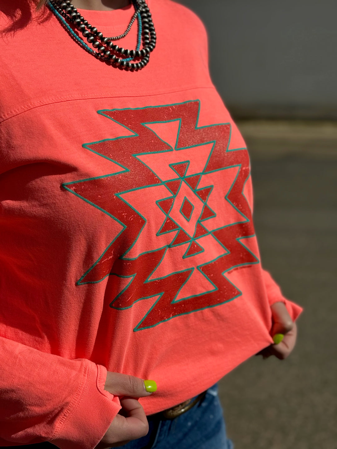 Aztec Puff on Coral Long Sleeve Top with thumb holes
