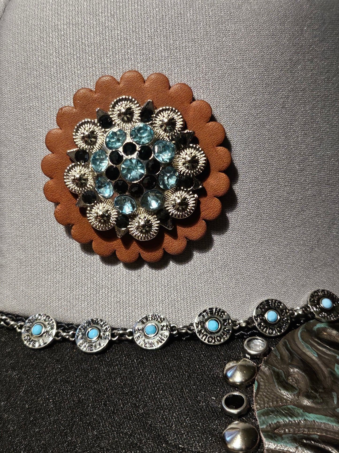 Western trucker hat with cowhide and conchos
