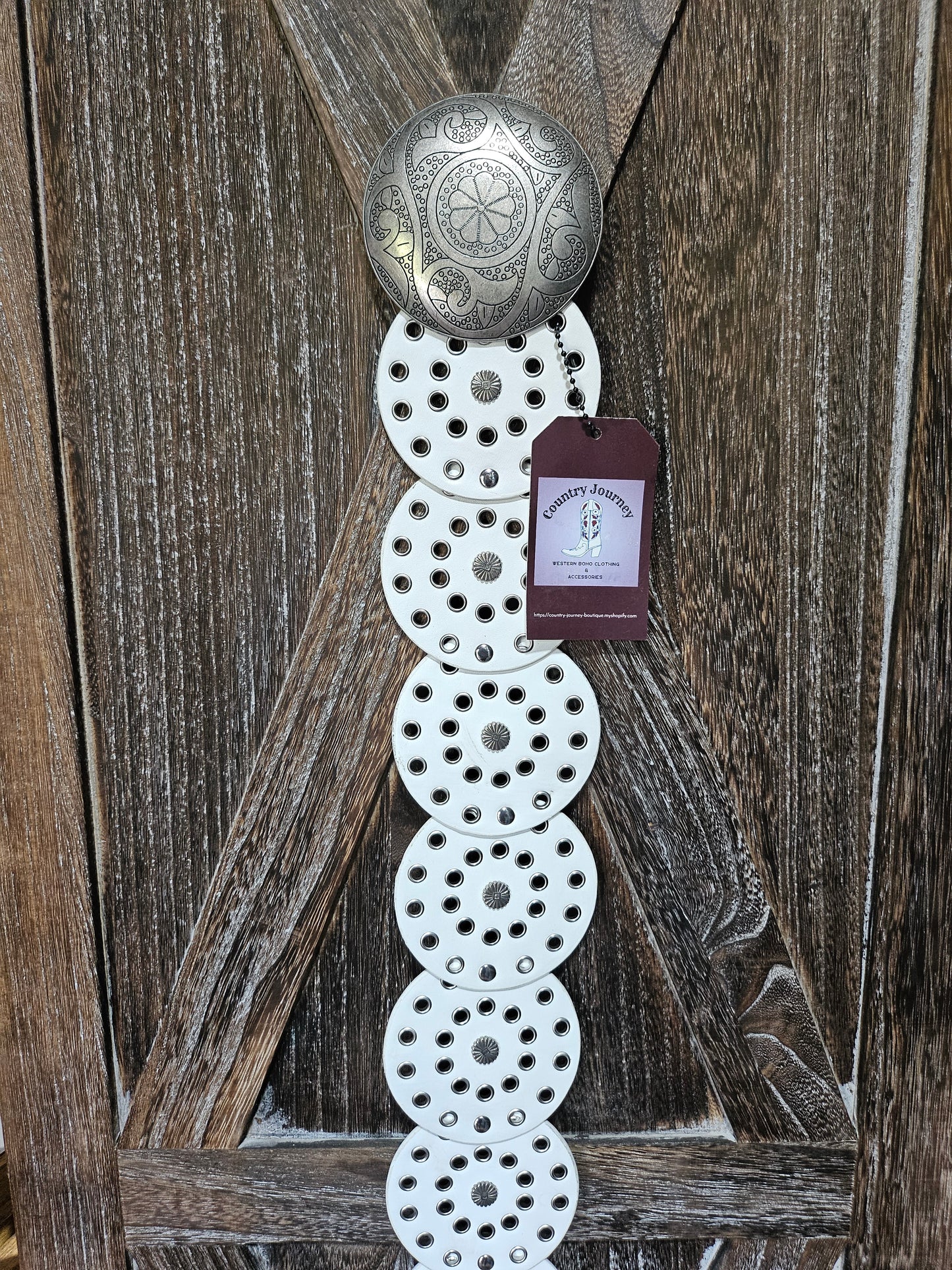 White disc waist belt with silver buckle