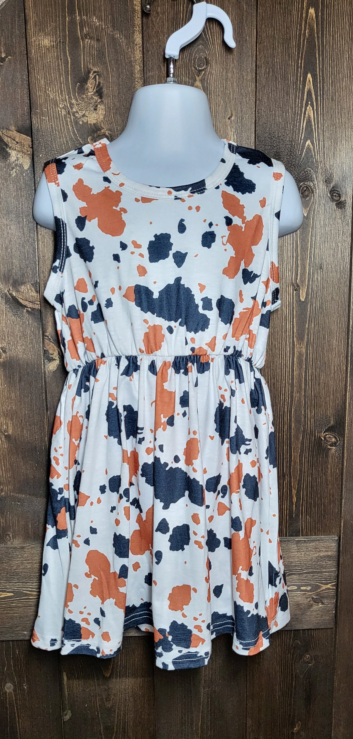 Girls dress in cowprint, sunflower, or watermelon and cropped jean jacket