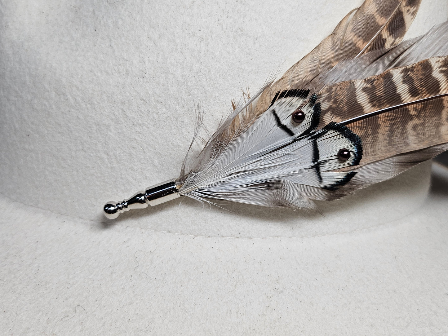 Genuine feather hat pin brooch accented with brown pearls