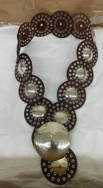 Genuine leather disc belt.
