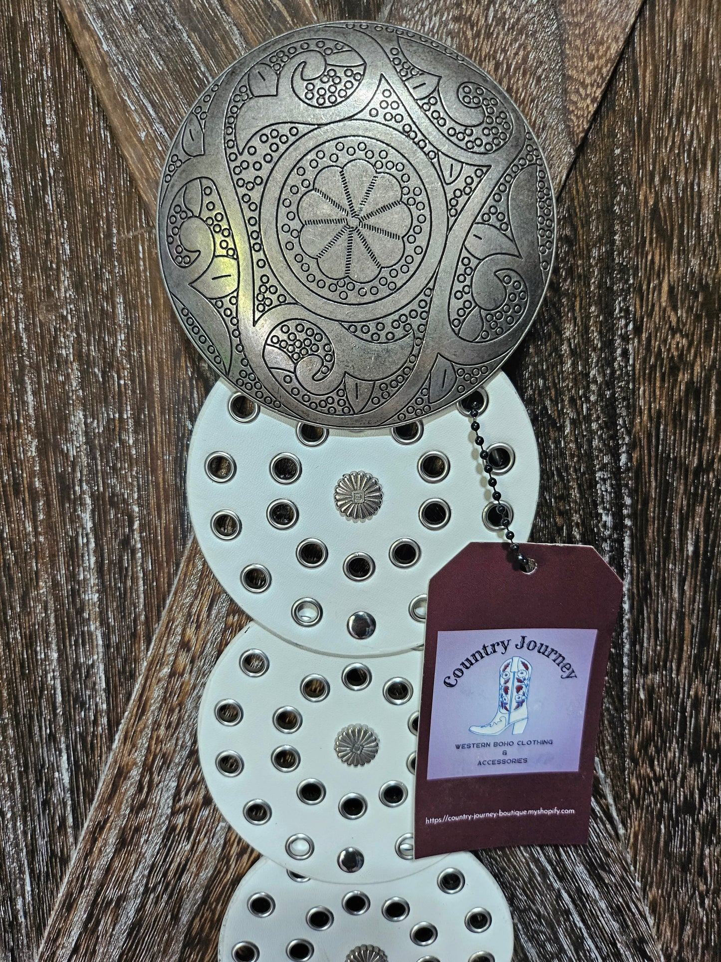 White disc waist belt with silver buckle