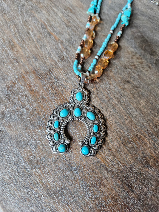 Squash blossom beaded necklace set.