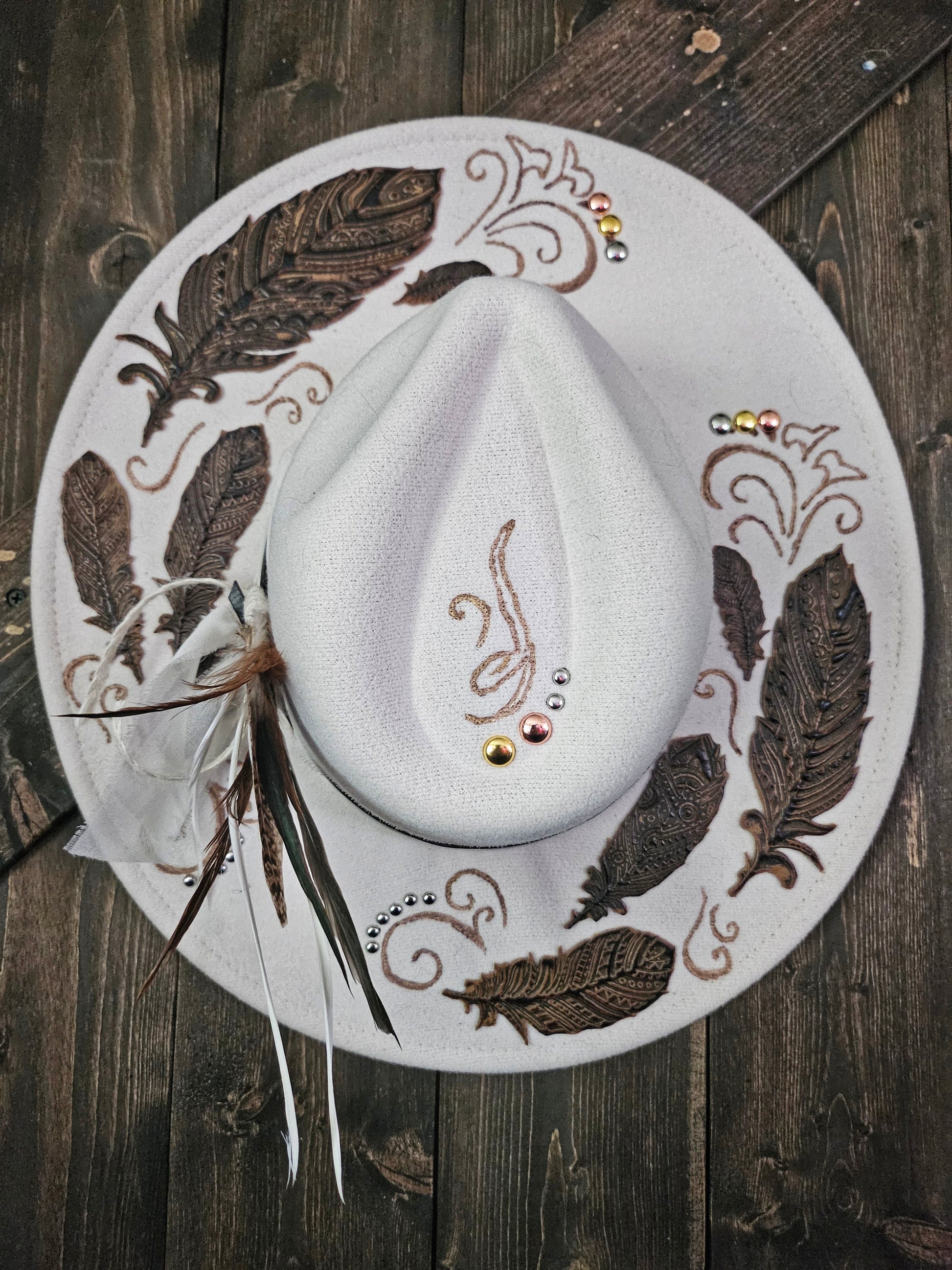 "Feathers in the wind" burned Fedora cowboy hat.