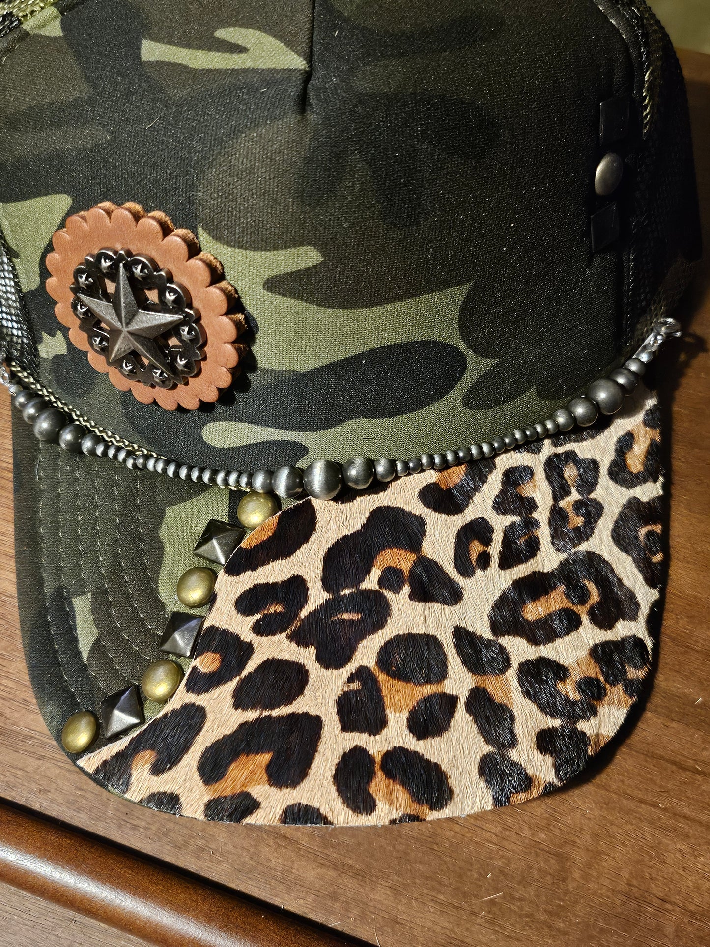Western trucker hat with cowhide and conchos