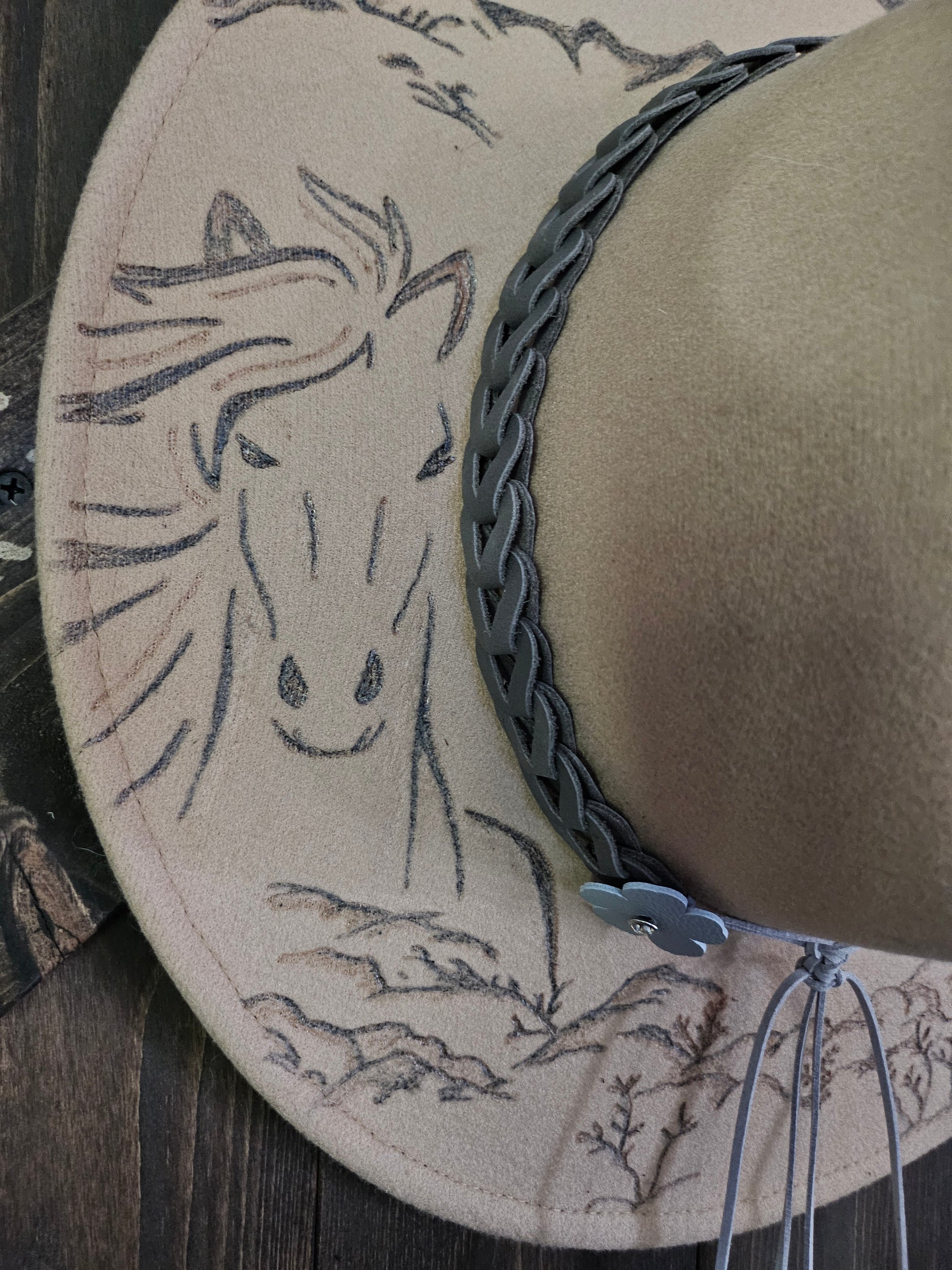 "Wild Horses" burned Fedora cowboy hat.