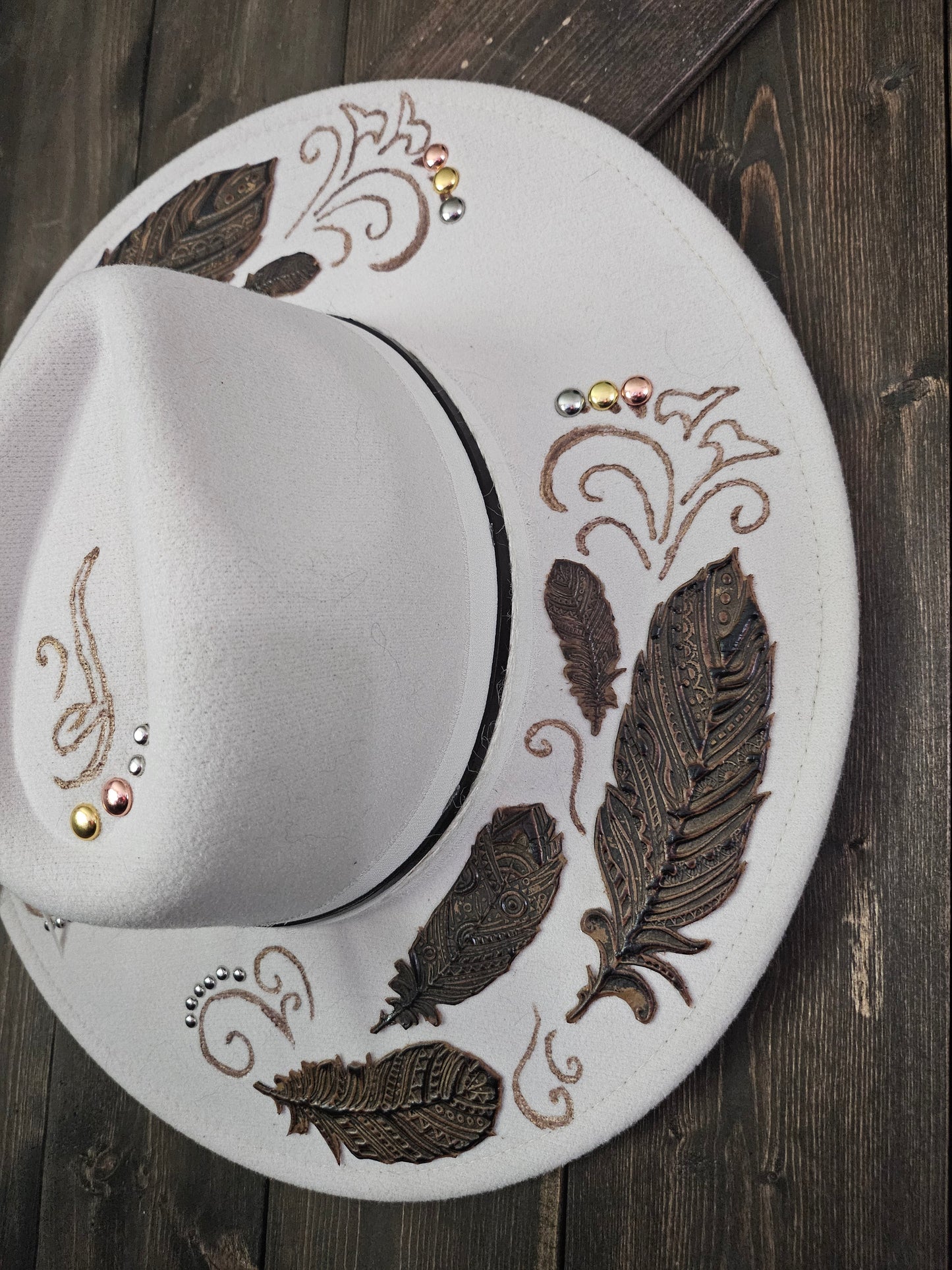 "Feathers in the wind" burned Fedora cowboy hat.