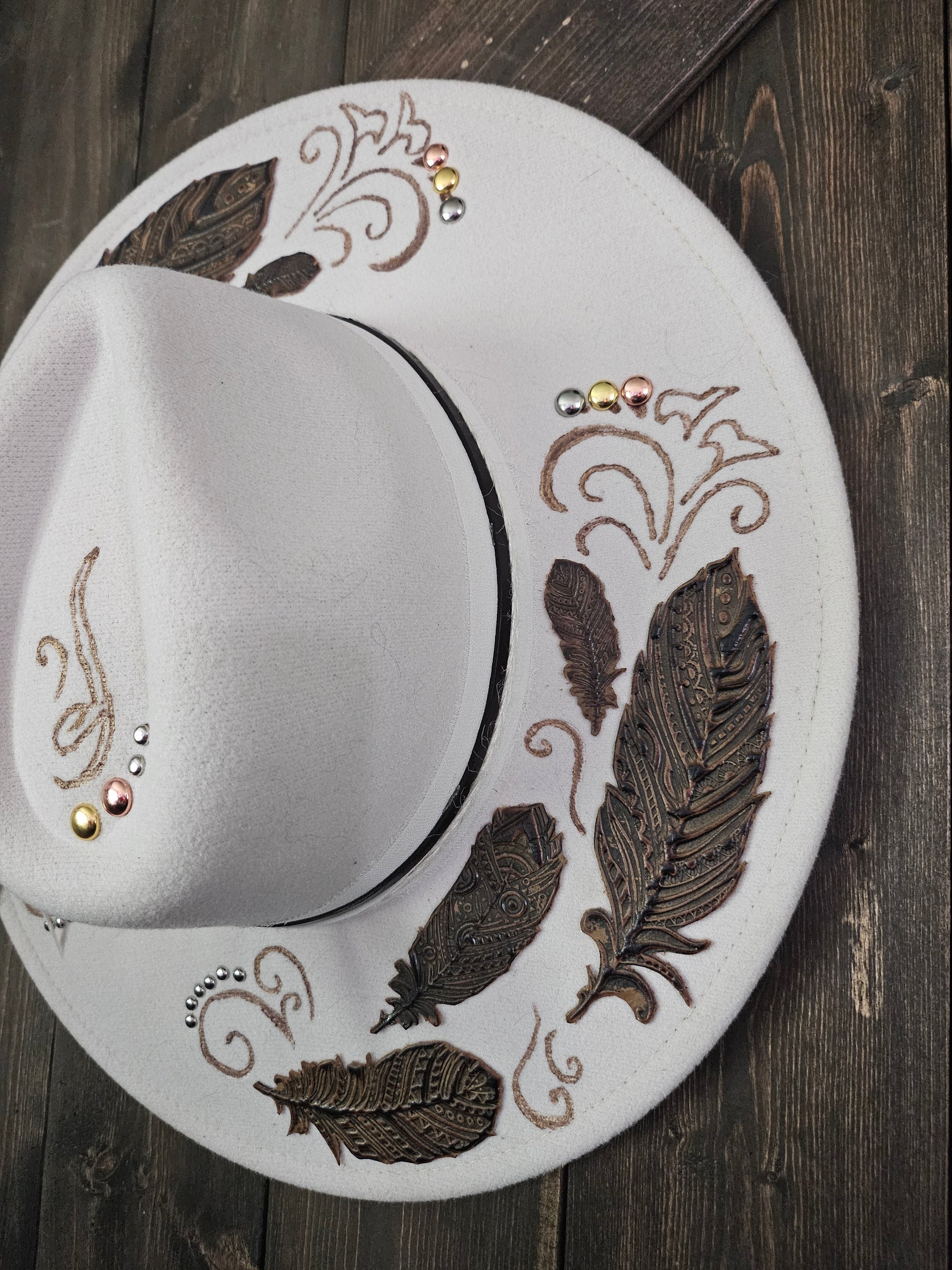 "Feathers in the wind" burned Fedora cowboy hat.