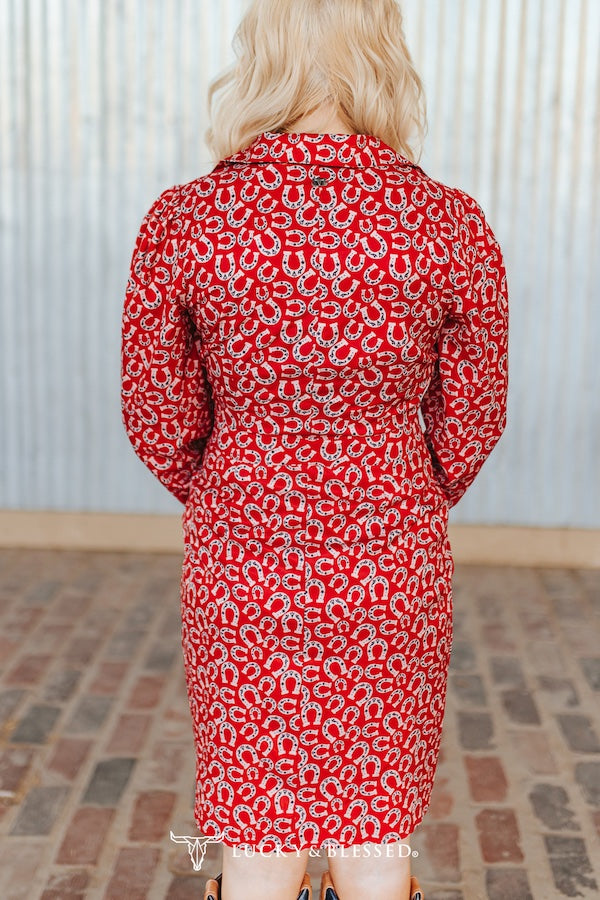 Red wrap dress with western horse shoe print