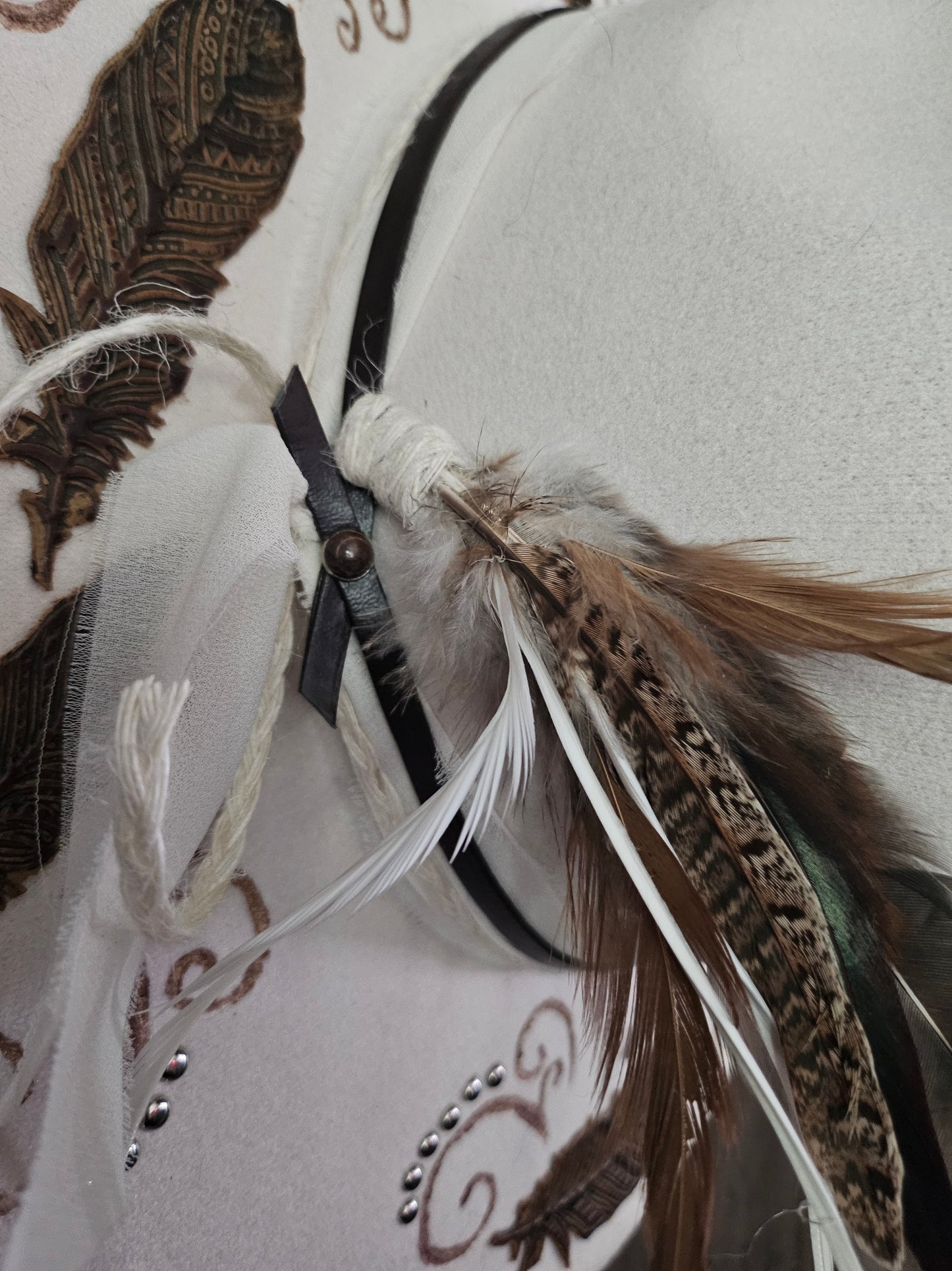 "Feathers in the wind" burned Fedora cowboy hat.