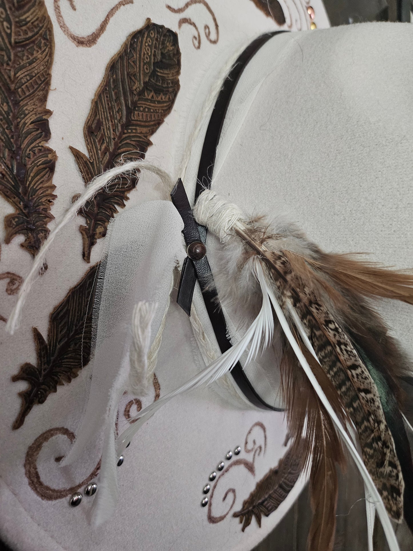 "Feathers in the wind" burned Fedora cowboy hat.