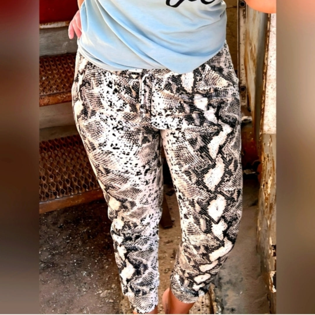 Ivory Snake Print Joggers With Pockets