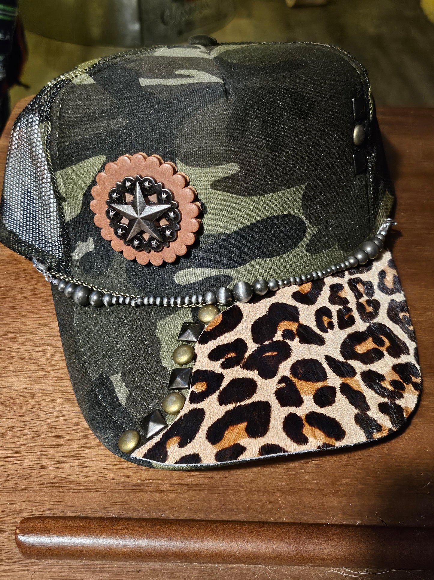 Western trucker hat with cowhide and conchos