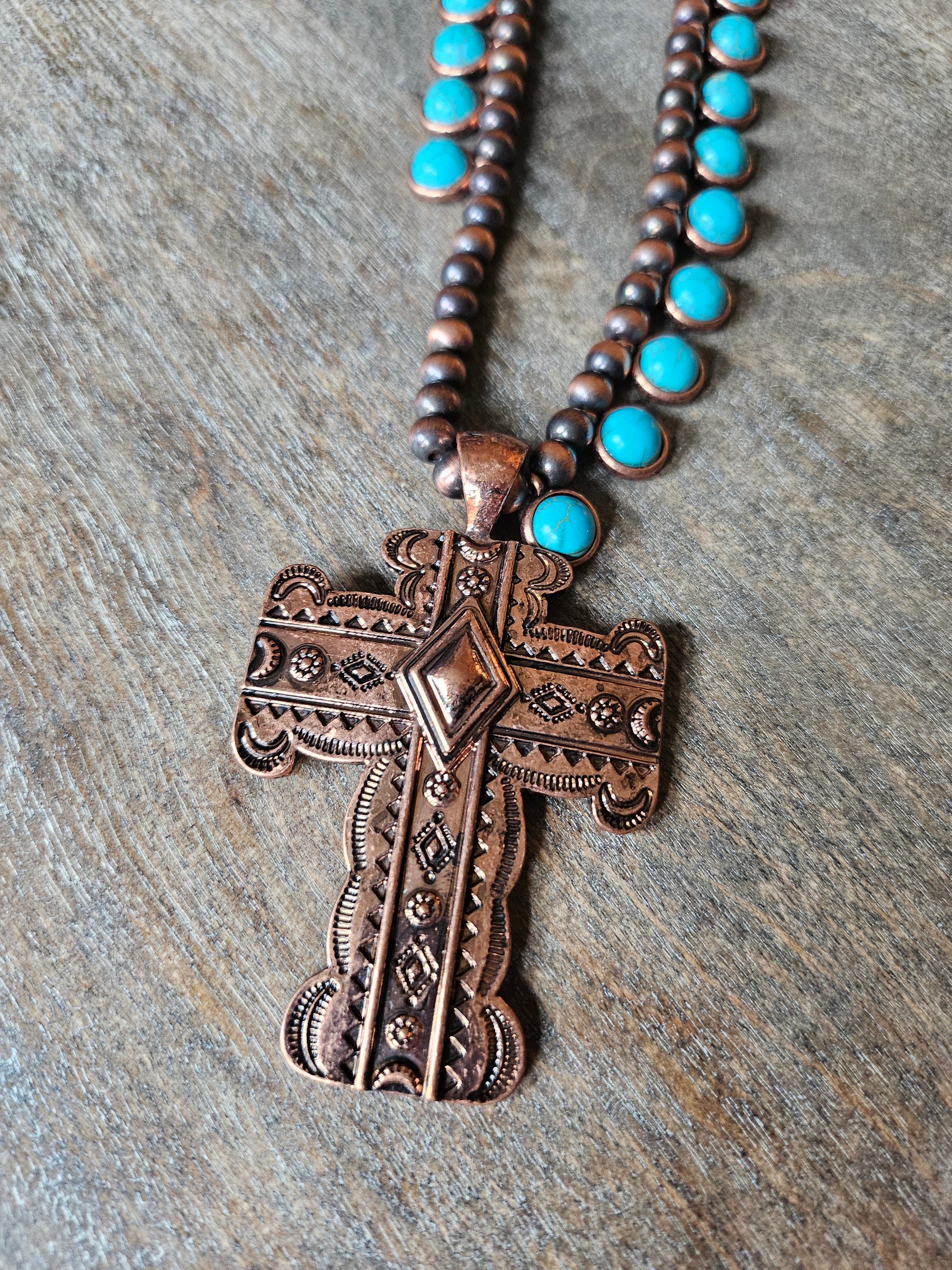 Bronze large cross pendant beaded necklace.