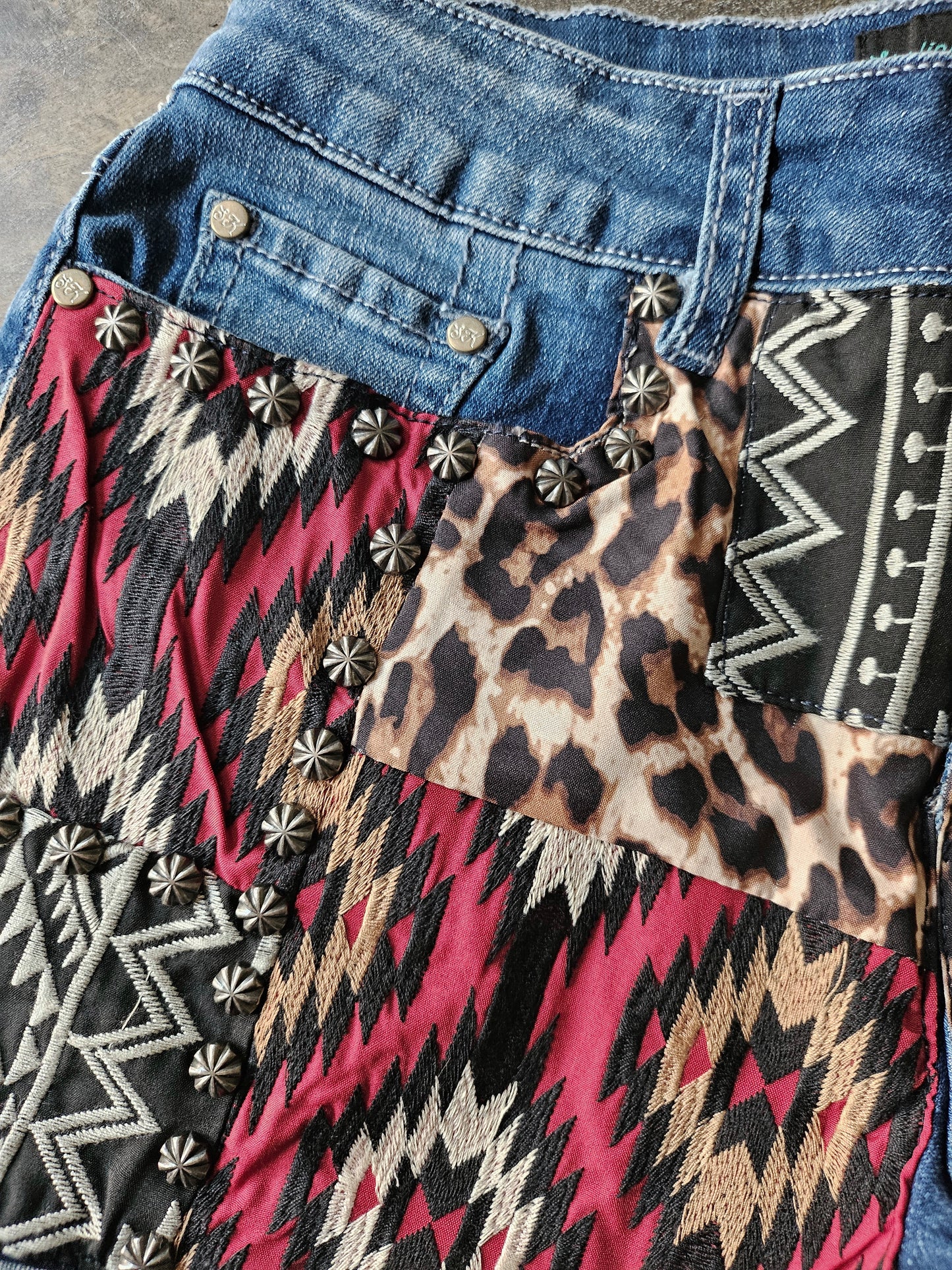 Patched Up Denim Shorts-In Red Aztec And Leopard Print