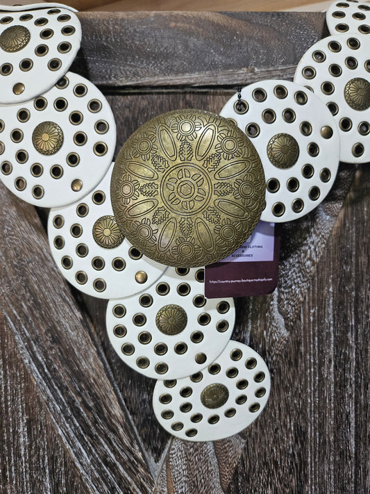 White and gold disc waist belt with gold buckle