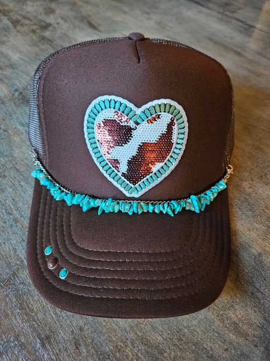 Turquoise trucker hat with sequin cow print heart